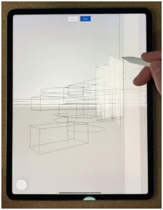 Alberto Beitia models a house in SketchUp software on an iPad